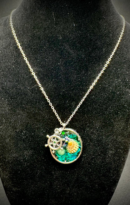 Nautical Charm Necklace with Ship Wheel, Seashell & Teal Resin – Handmade Beach Jewelry, Ocean Inspired Gift